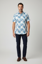 Model wearing blue floral shirt - front view