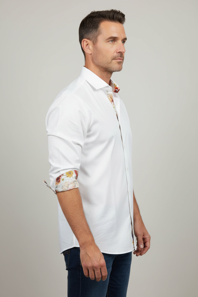 Model wearing white shirt with floral cuffs - side view
