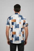 Model wearing abstract block print shirt - back view